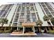 Multi-story building, Dolphin Cove 255, with entrance and parking at 255 Dolphin Pt # 809, Clearwater, FL 33767