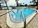Relaxing community pool with easy access via steps at 255 Dolphin Pt # 809, Clearwater, FL 33767