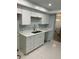 Modern kitchen, featuring white shaker cabinets and new appliances at 255 Dolphin Pt # 809, Clearwater, FL 33767