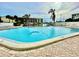Inviting community pool with ample deck space for lounging at 255 Dolphin Pt # 809, Clearwater, FL 33767