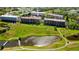 Aerial view of condo community near water at 9490 Harbor Greens Way # 205, Seminole, FL 33776