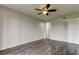 Bedroom with laminate flooring and ceiling fan at 9490 Harbor Greens Way # 205, Seminole, FL 33776