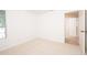 Empty bedroom featuring neutral carpet, walk-in closet and ample natural light at 379 Fan Palm Ne Ct # 0, St Petersburg, FL 33703