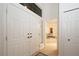 Bright foyer featuring double doors, hardwood floors, high ceilings, and access to living areas at 379 Fan Palm Ne Ct # 0, St Petersburg, FL 33703