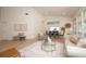 Bright and airy living room features vaulted ceilings, neutral decor, and lots of natural light at 379 Fan Palm Ne Ct # 0, St Petersburg, FL 33703