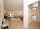 Open-concept living room with neutral decor, abundant natural light, and seamless flow to the dining area at 379 Fan Palm Ne Ct # 0, St Petersburg, FL 33703
