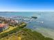 Aerial view of marina, waterfront homes, and beautiful bay at 5823 Bowen Daniel Dr # 905, Tampa, FL 33616