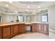Elegant bathroom with double vanity and soaking tub at 5823 Bowen Daniel Dr # 905, Tampa, FL 33616
