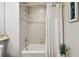 Clean bathroom with shower/tub combo at 5823 Bowen Daniel Dr # 905, Tampa, FL 33616