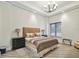 Spacious bedroom with plush bedding and nightstands at 5823 Bowen Daniel Dr # 905, Tampa, FL 33616