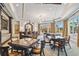Spacious clubhouse with comfortable seating and game tables at 5823 Bowen Daniel Dr # 905, Tampa, FL 33616