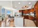 Open concept kitchen with island and granite countertops at 5823 Bowen Daniel Dr # 905, Tampa, FL 33616
