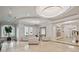 Bright and airy lobby with seating area and large windows at 5823 Bowen Daniel Dr # 905, Tampa, FL 33616