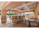 Outdoor patio area with grilling station and seating at 5823 Bowen Daniel Dr # 905, Tampa, FL 33616