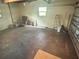 Unfinished garage with concrete floor and overhead door at 2811 Valencia S Way, St Petersburg, FL 33705