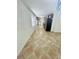 Open kitchen with stainless steel appliances and tile flooring at 2811 Valencia S Way, St Petersburg, FL 33705