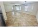 Large living area with tile flooring and multiple windows at 2811 Valencia S Way, St Petersburg, FL 33705