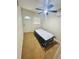 Cozy bedroom with door access and ceiling fan at 2811 Valencia S Way, St Petersburg, FL 33705