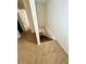 Stairwell leading to the second floor with carpeted flooring at 2811 Valencia S Way, St Petersburg, FL 33705