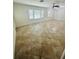 Spacious living room with tile flooring, ceiling fan, and large windows at 2811 Valencia S Way, St Petersburg, FL 33705