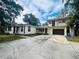 Two story home with attached garage and driveway at 2811 Valencia S Way, St Petersburg, FL 33705