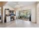 Home office with built-in shelving, desk, and view of the patio at 1044 Blyth Hill Ct, Trinity, FL 34655