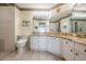 Bathroom with walk-in shower and granite countertops at 1044 Blyth Hill Ct, Trinity, FL 34655