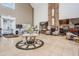 Spacious lobby featuring a fireplace and ample seating at 1044 Blyth Hill Ct, Trinity, FL 34655