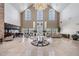 Grand lobby with high ceilings, chandelier, and water view at 1044 Blyth Hill Ct, Trinity, FL 34655