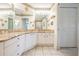 Large bathroom with granite countertops and walk-in shower at 1044 Blyth Hill Ct, Trinity, FL 34655