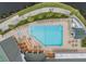 Resort-style pool with plenty of lounge chairs at 1044 Blyth Hill Ct, Trinity, FL 34655