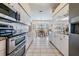 Kitchen with stainless steel appliances, granite countertops, and breakfast nook at 1044 Blyth Hill Ct, Trinity, FL 34655