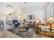 Spacious living room with comfortable seating and large windows at 1044 Blyth Hill Ct, Trinity, FL 34655