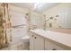 Bathroom with tub, shower, and updated vanity at 1044 Blyth Hill Ct, Trinity, FL 34655