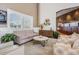 Lobby lounge area with modern furniture and plants at 1044 Blyth Hill Ct, Trinity, FL 34655