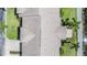 Top-down view of a house's roof, landscaping and driveway at 1044 Blyth Hill Ct, Trinity, FL 34655