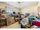 Bedroom with large windows and wood flooring at 1044 Blyth Hill Ct, Trinity, FL 34655