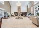 Elegant lobby with high ceilings, chandelier, and comfortable seating at 1044 Blyth Hill Ct, Trinity, FL 34655
