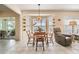 Breakfast nook with a round table and chairs, adjacent to kitchen at 1044 Blyth Hill Ct, Trinity, FL 34655