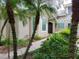Two-story house with walkway and landscaping at 379 Fan Palm Ne Ct # 0, St Petersburg, FL 33703
