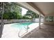 Inviting pool with patio and fenced backyard at 379 Fan Palm Ne Ct # 0, St Petersburg, FL 33703