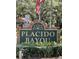 Placido Bayou community entrance sign at 379 Fan Palm Ne Ct # 0, St Petersburg, FL 33703