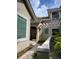 Two-story house with walkway and landscaping at 379 Fan Palm Ne Ct # 0, St Petersburg, FL 33703