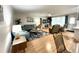 Bright living room with hardwood floors and comfortable seating at 5750 80Th N St # C108, St Petersburg, FL 33709