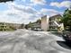 Two-story apartment building with ample parking and landscaping at 5750 80Th N St # C108, St Petersburg, FL 33709