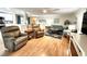 Spacious living room featuring hardwood floors and comfy furniture at 5750 80Th N St # C108, St Petersburg, FL 33709