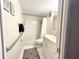 Clean bathroom with shower, toilet, and vanity with good storage at 5750 80Th N St # C108, St Petersburg, FL 33709