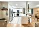 Modern kitchen with stainless steel appliances and breakfast bar at 5750 80Th N St # C108, St Petersburg, FL 33709