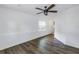 Spacious basement with neutral walls and wood-look flooring at 5609 20Th S Ave, Gulfport, FL 33707