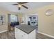 Kitchen island with breakfast bar overlooks living room at 5609 20Th S Ave, Gulfport, FL 33707